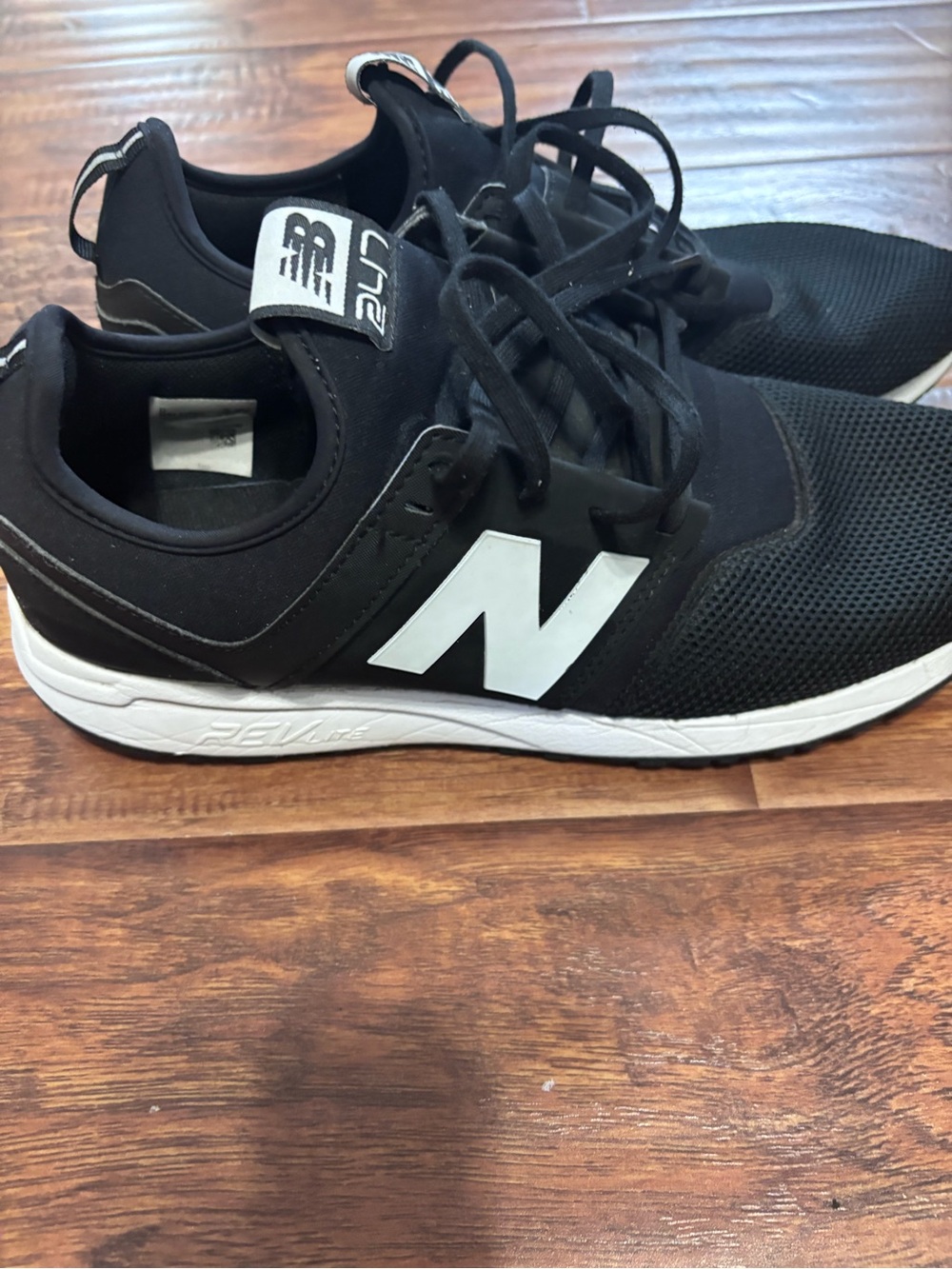 New Balance 247 Black and White Men's Athletic Sneakers